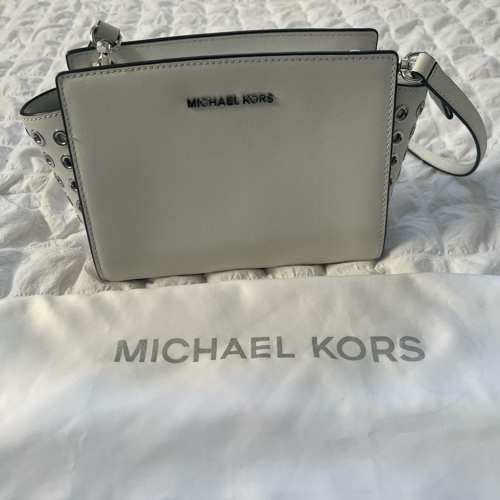Michael kors white purse 8.5 inch  x 7 inch silver accent very good condition